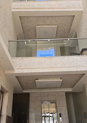 A distinctive ground floor apartment for sale, with luxurious finishes, 205 square meters, and outdoor terraces, in the most beautiful locations in Shafa Badran El Kom.